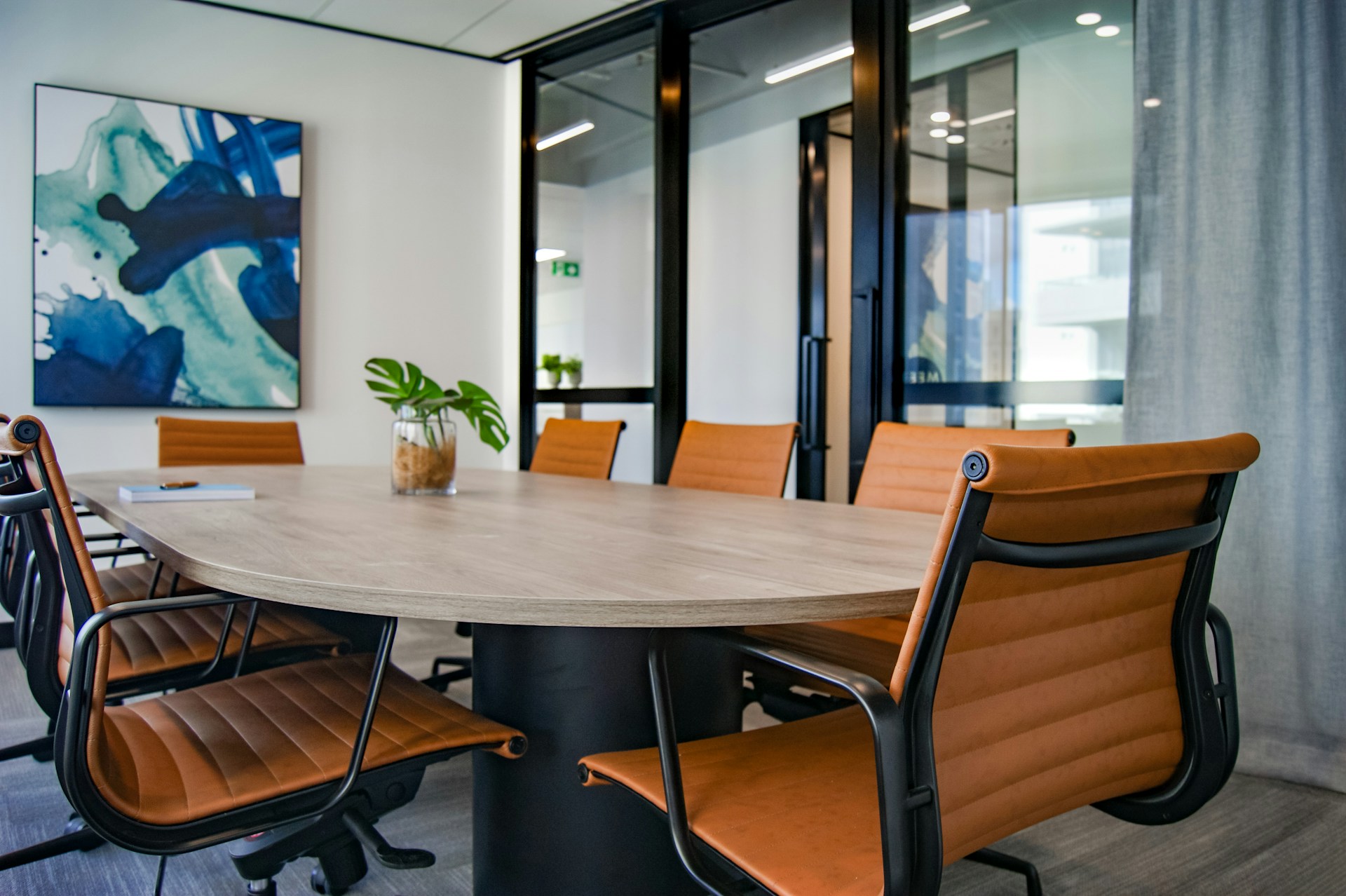 Professional board support services showing business meeting in modern conference room
